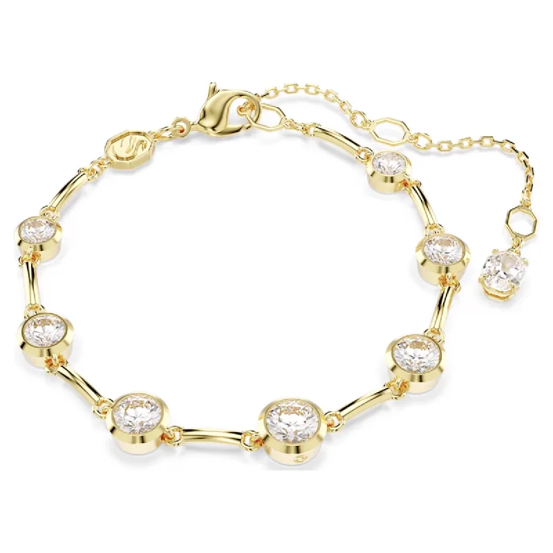 Women’s charm bracelets-Swarovski Imber Crystal Bezel Tennis Bracelet in Yellow Tone Plate