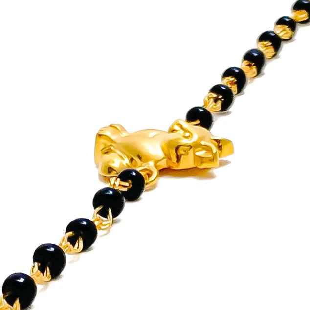 Women’s statement cuff bracelets-Charming Ethereal 22k Gold Black Bead Baby Bracelet