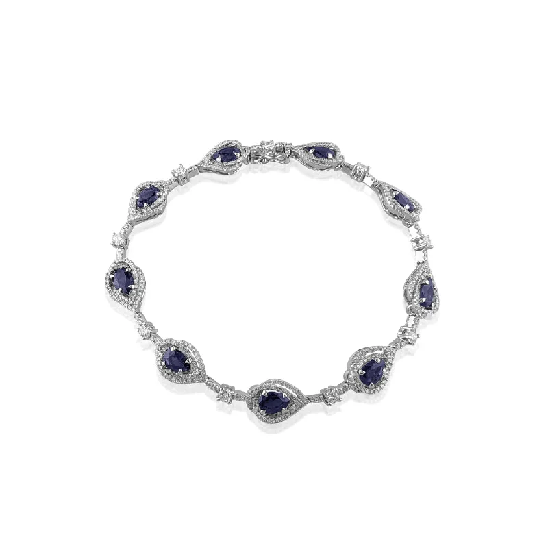 Women’s lucky charm bracelets-18K White gold bracelet with diamonds and blue sapphire