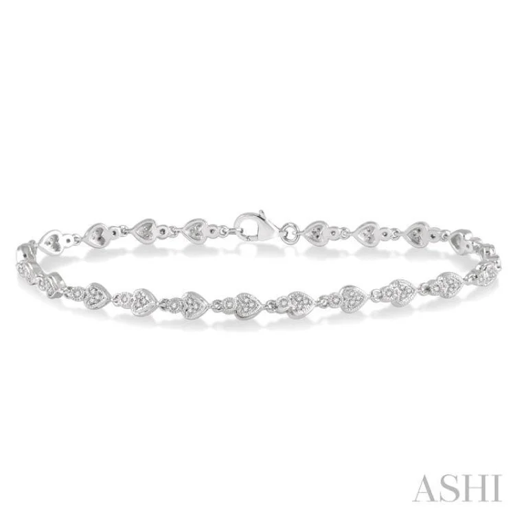 Women’s braided bracelets-1/3 Ctw Heart Charm Round Cut Diamond Link Bracelet in 10K White Gold