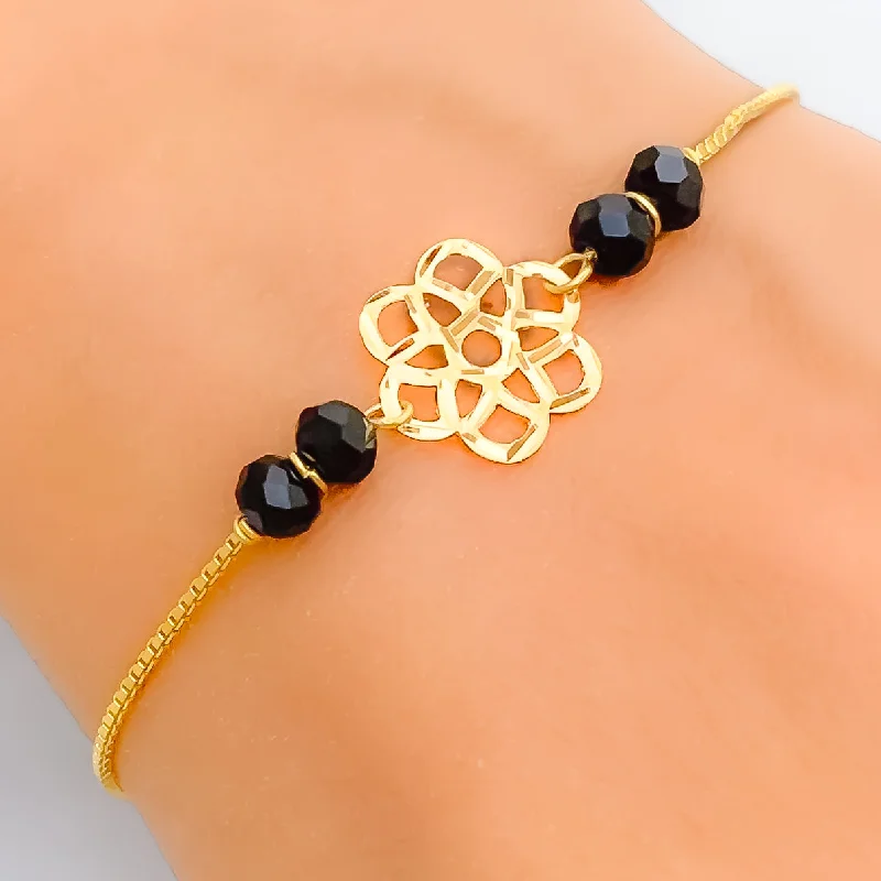 Women’s thin bangles-Dazzling Flower 22k Gold Black Bead Bracelet