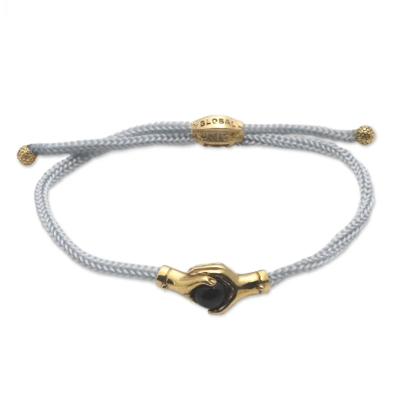 Women’s cuff bracelets-Novica Handmade Golden Grey Handshake Brass And Black Agate Unity Bracelet