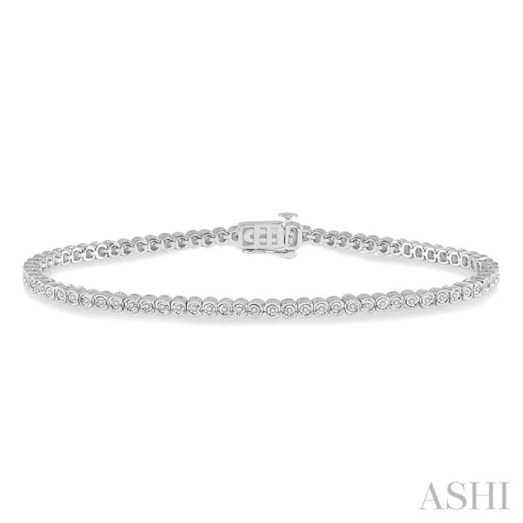 Women’s charm bangles-1/4 Ctw Round Cut Diamond Miracle Plate Bracelet in 10K White Gold