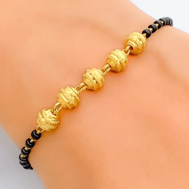 Women’s elegant bangles-Radiant Ornate 22k Gold Black Bead Bracelet