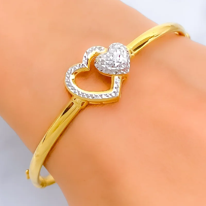 Women’s anniversary bracelets-Captivating Twin Heart 22k Gold Bangle Bracelet